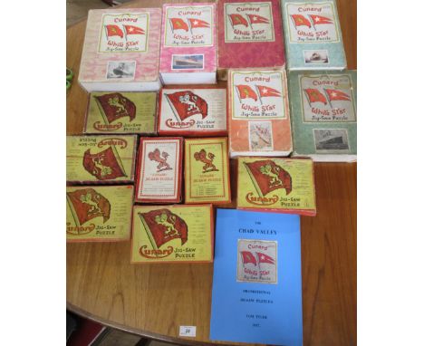 A collection of Chad Valley Cunard jigsaws, to include six White Star line puzzles and a book