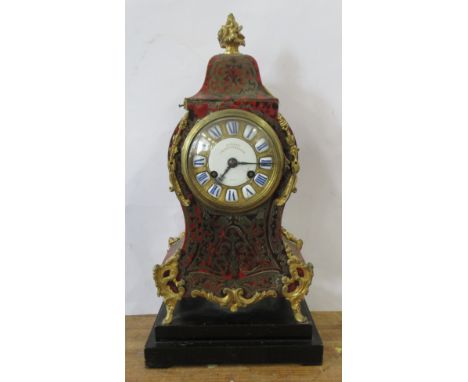 A 19th century French boulle work mantel clock, the enamel and gilt metal dial inscribed Aubert, Klaftenberger Geneve, on ste