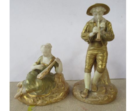 Two&nbsp;Royal Worcester gilded ivory figures, a seated woman playing the lute, model number 1547 and a man playing a pipe, m