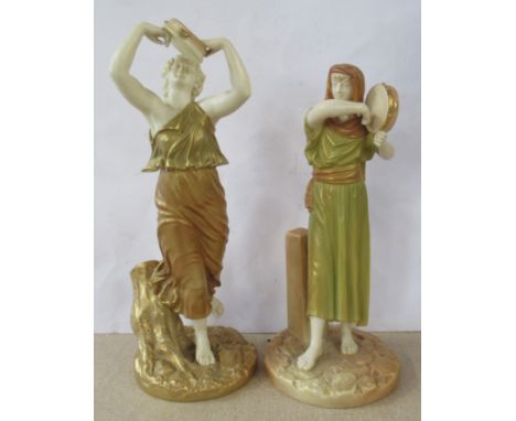 Two Royal Worcester shot silk figures, both of woman playing tambourines, model number 2016 and 1084, height 10ins and 9.5ins