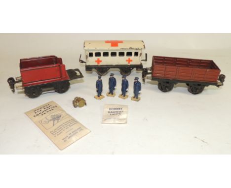 O Gauge - tinplate Red Cross carriage; a Marklin open wagon; a Marklin tender; a heavy brass loco lamp; four Dinky toys cast 