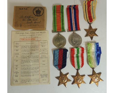 WWII group of six: WM DM 1939-45 Star, Atlantic, Italy and Africa stars in their original postage box and with medal allocati