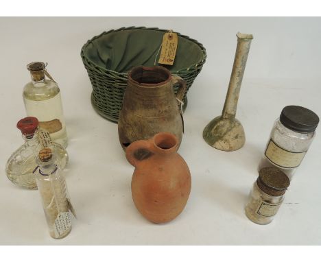 An ancient Egyptian pottery vase; a bottle of water from Jacobs Well, Samaria and small bottle of water from the River Jordan