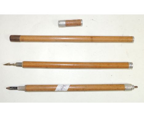 A 20th Century novelty walking stick, the sectional shaft unscrewing to reveal a pencil and dip pen, overall length 70cms