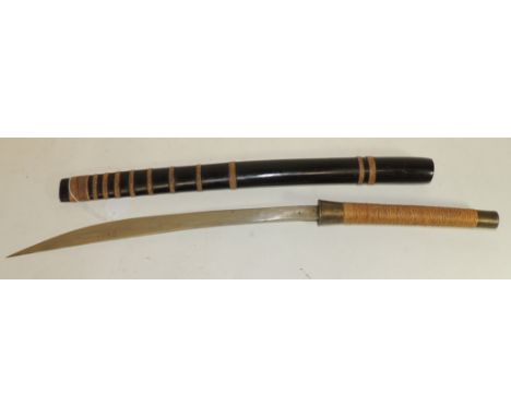 A 20th Century Burmese dha with plaited cane grip and in ebonised wood scabbard, overall length 66.5cms