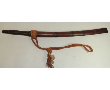 A Burmese dha short sword having horn covered and chequered wood grip, slightly curved single edged blade with incurved end a