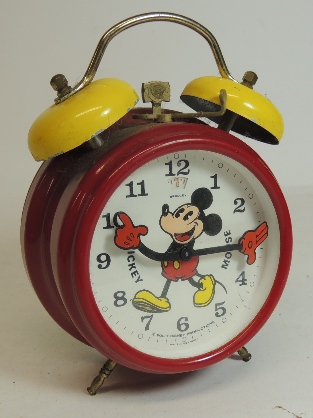 A Bradley (German made) Mickey Mouse alarm clock in red plastic case ...