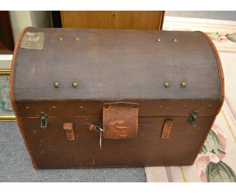 A studded canvas and leather dome topped trunk, 75cm by 48cm by 57cm  