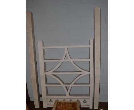 A painted wooden five bar gate with gate posts, with diamond motif and panel of six trefoil, 105cm by 142cm