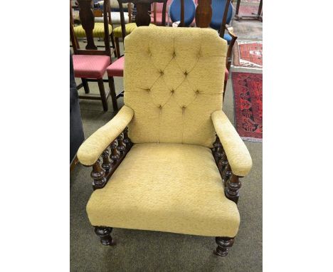A 19th century mahogany framed, button backed armchair