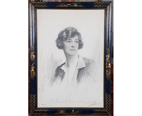 Charcoal portrait of a lady, indistinctly signed and dated 1927, in a blue lacquered chinoisere frame, 74cm by 50cm 