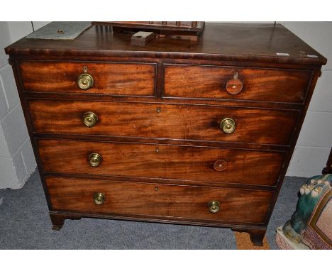 A George III mahogany four height chest of drawers, raised on splayed bracket supports, 104cm by 53cm by 90cm 