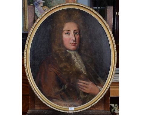 Manner of Godfrey Kneller (19th century) portrait of a man, oil on canvas laid to board oval, 74cm by 61cm