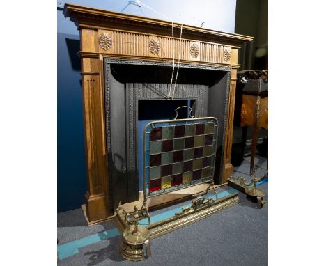 A GEORGIAN STYLE PINE FIRE SURROUND 129cm wide x 15cm deep x 114cm high together with a cast iron insert, 92cm wide x 13cm de