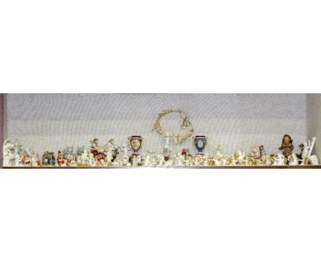 A LARGE COLLECTION OF GERMAN CERAMIC CAKE DECORATIONS to include: angels, children, ladybird musicians, Father Christmas, tob