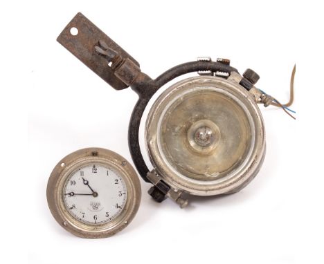 AN EARLY SMITHS CAR CLOCK and driving lamp
