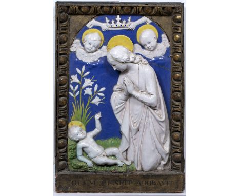 A 19TH CENTURY TIN GLAZED TERRACOTTA DELLA ROBBIA STYLE RELIEF PLAQUE depicting the adoration of The Virgin, the plaque with 