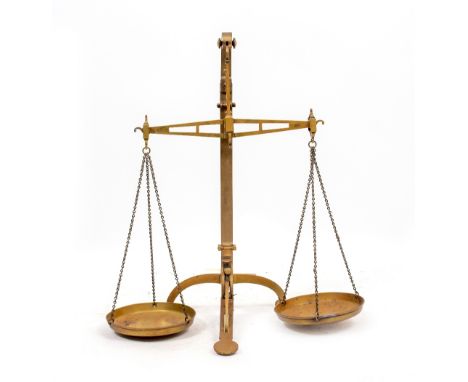 A SET OF VICTORIAN BRASS SCALES by W &amp; T Avery with adjustable foot, 75cm high together with a set  of Victorian W &amp; 