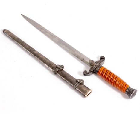 A WORLD WAR II GERMAN ARMY OFFICER'S DAGGERthe 10 inch blade with an Eickhorn mark, the hilt with silvered mounts and orange 