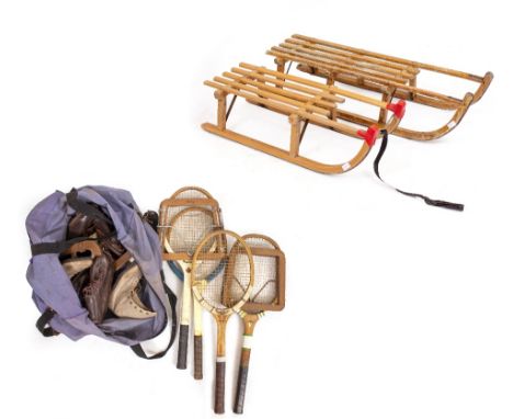 TWO WOODEN SLEDGES with metal runners one named 'Davos', four wooden tennis racquets and two frames to include Dunlop and Sla