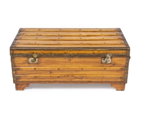A CAMPHOR WOOD BRASS BOUND TRUNK  with carrying handles to the side, 100cm wide x 55cm deep x 43cm high 