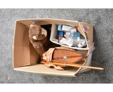 A box of mixed Toys including Dinky and Corgi playworn Diecasts, wooden Pond Yacht and a plush Monkey