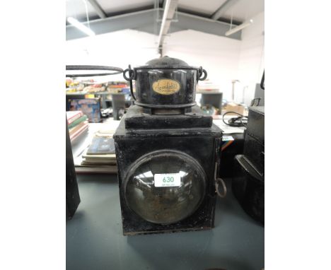 A Sandstar Railway Crossing Lamp having single lens and carry handle, height 38cm