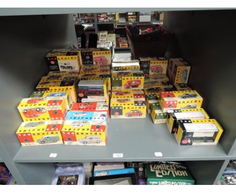 A shelf of Lledo Vanguards diecasts, Vans, Wagons, Cars etc,limited editions, special editions, boxed sets, all boxed, approx