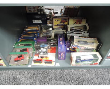 A shelf of Corgi, EFE, Days Gone and similar diecasts including boxed sets, Thrust SSC, Cadburys, Classics etc, all boxed, ap