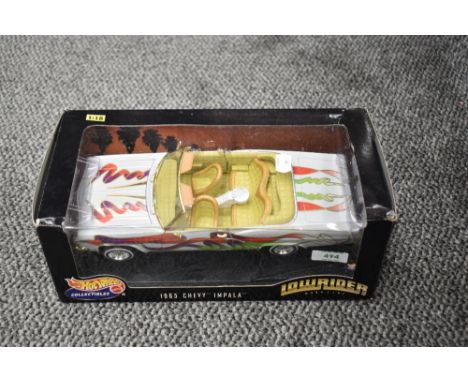 A Mattel Hot Wheels 1:18 scale diecast, Low Rider 1965 Chevy Impala, in original box