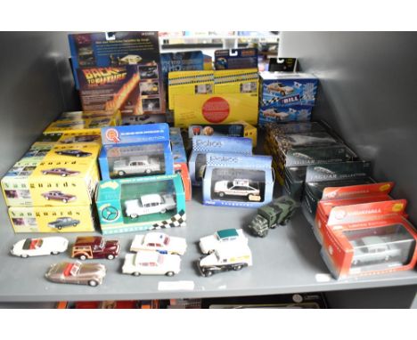 A shelf of modern diecasts including Vanguards, Lledo Vauxhall and Jaguar etc, most boxed approx 30+