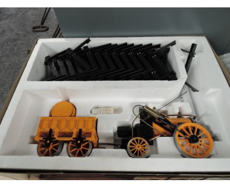 A Hornby 3.5' gauge Stephenson Rocket Locomotive Steam Engine with track, boxed with leaflet