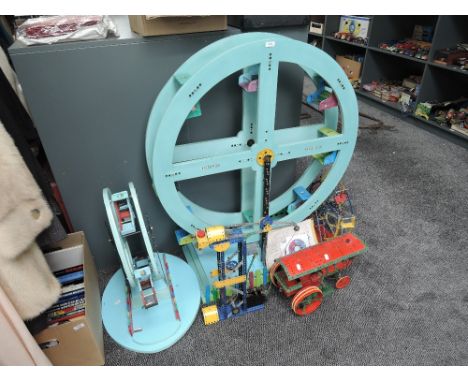A collection of Meccano including Traction Engine, Crane, Ferris Wheel and two wooden Sickocks Ferris Wheels, large and small