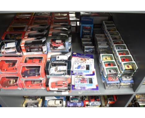 A shelf of mixed scale Cararama diecasts, all boxed approx 120+