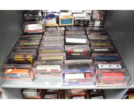 A shelf of Corgi Original Omnibus and similar diecast Buses, all boxed, approx 30