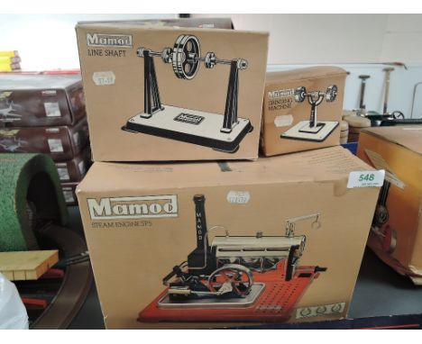 A Mamod Live Steam Engine SP5 along with Line Shaft and Grinding Machine, all three items in original boxes