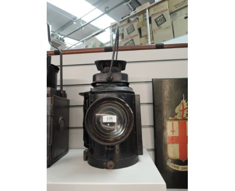 A LMS Railway Adlake Non Sweating Lamp having single bulls eye lens, height including handle 47cm