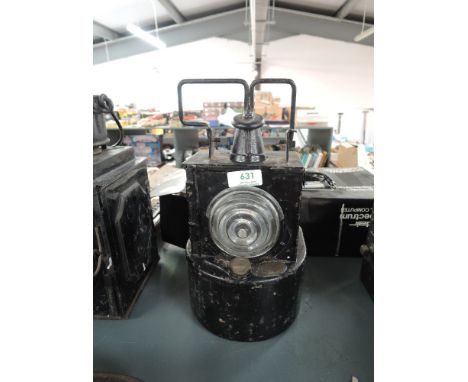 A LMS Railway Signal Lamp by Lamp Manufacturing &amp; Railway Supplies, having two brass plaques and carry handle, numbered 2