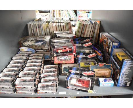 A shelf of modern diecasts including Green Light Loot Crate, Dickie American Dream, Diecast Metal Collection and similar  all