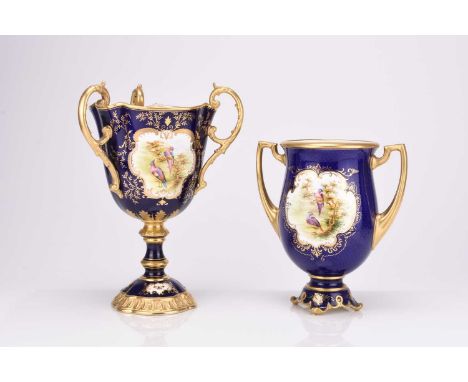 A large Coalport trophy vase, early 20th century, of three handled form, the cobalt blue ground with gilt handles and rims, p