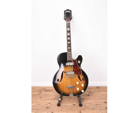 A Harmony 'Meteor' electric guitar, in sunburst colour, with associated hard caseBody: Hollow, sunburst, spruce top, maple si