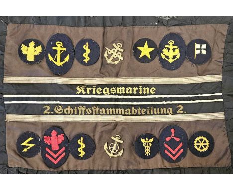 A selection of German Third Reich Kriegsmarine insignia - comprising two beVo cap tallies; 'Kriegsmarine' and '2.Schiffsstamm