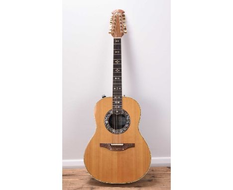 An Ovation 12-string electro-acoustic guitarModel 1659, serial no. 271456, mid 1980sTop: Natural spruce, ivorine and pearloid