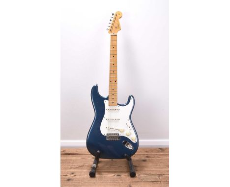 A Stratocaster electric guitar, labelled Tokai Goldstar SoundBody: Solid, metallic 'Caribean' blue, white pickguardNeck: Mapl