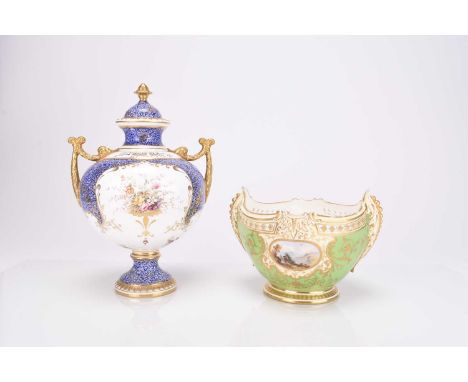 A Coalport vase and cover, early 20th century, of twin-handled form, light scaled blue ground reserving panels of hand-colour