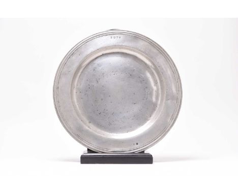 17th century pewter chargerWith triple reeded edge to the 6.5cm rim, touchmarks of John Greenbank II of Worcester.46.5cm dia.