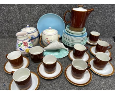 Box lot containing miscellaneous pieces of vintage Poole ware including plates, brown tea set, lidded baskets etc