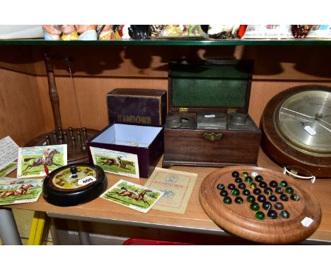 A GROUP OF GAMES, A TEA CADDY AND A BAROMETER, comprising a boxed Sandown horse racing game by F H Ayres, with rules, spinnin