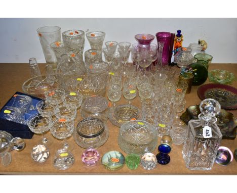 A QUANTITY OF COLOURED GLASS AND CUT CRYSTAL,  comprising a pair of Stuart Crystal brandy glasses, six champagne glasses, an 