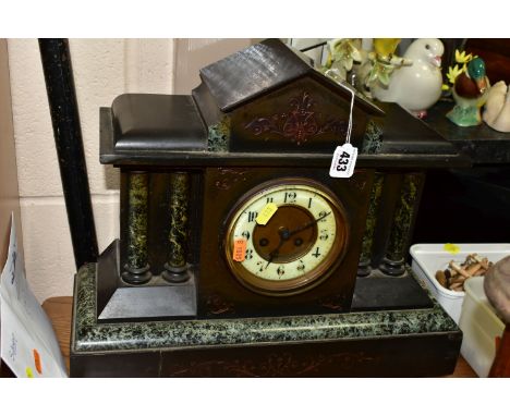 A VICTORIAN BLACK SLATE AND MARBLE MANTEL CLOCK, with pendulum and five keys, brass framed face,  green mottled marble column